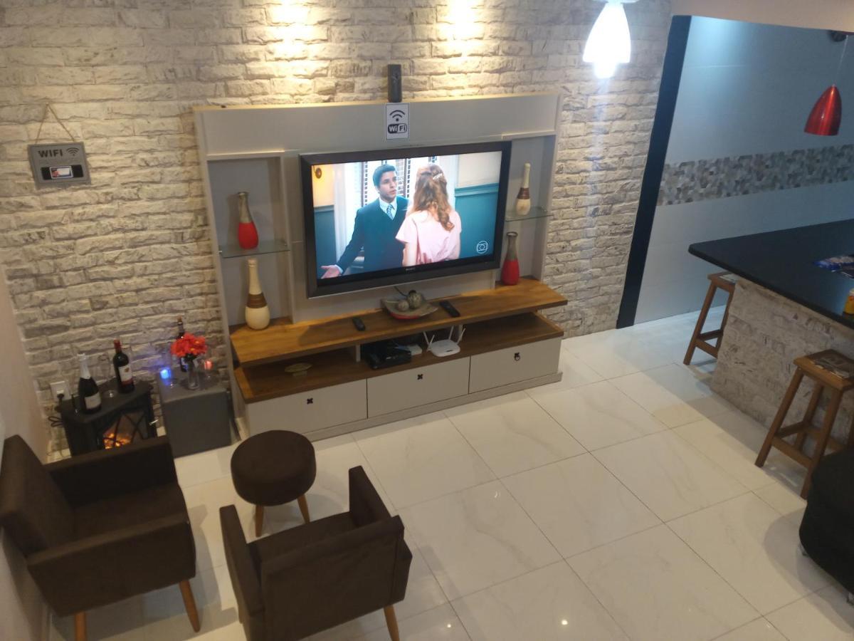 Casa Moderna E Aconchegante Com Opcao De Piscina Aquecida Cobrado A Parte, Ampla Area Gourmet Com Churrasqueira Em Deck Coberto Frente A Piscina, Aconchegante Sala De Estar Com Lareira, Ampla Garagem Para 4 Carros, Casa Pe Na Areia A 50 Metros Da Pra Praia Grande  Exterior foto